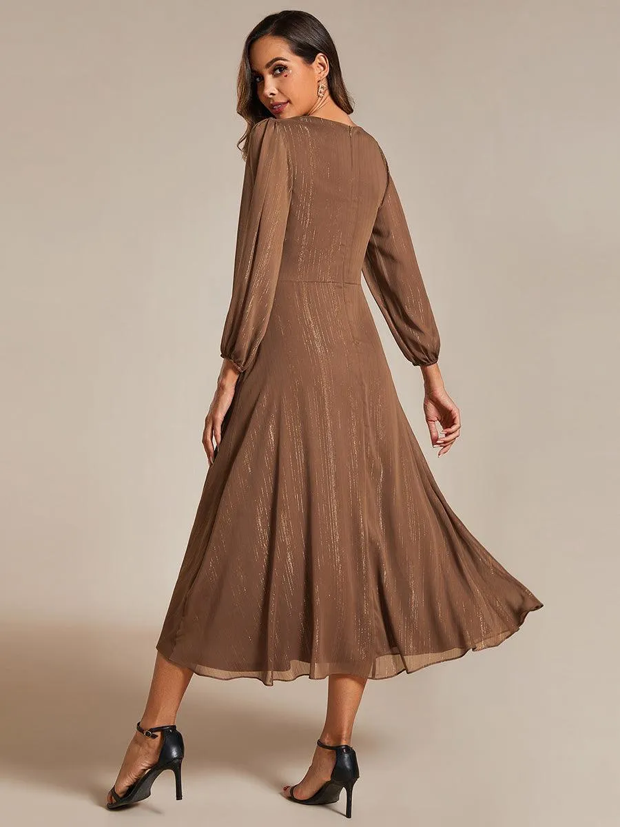 Robe de soirée trapèze scintillante à manches longues et col en V en mousseline de soie avec torsadé