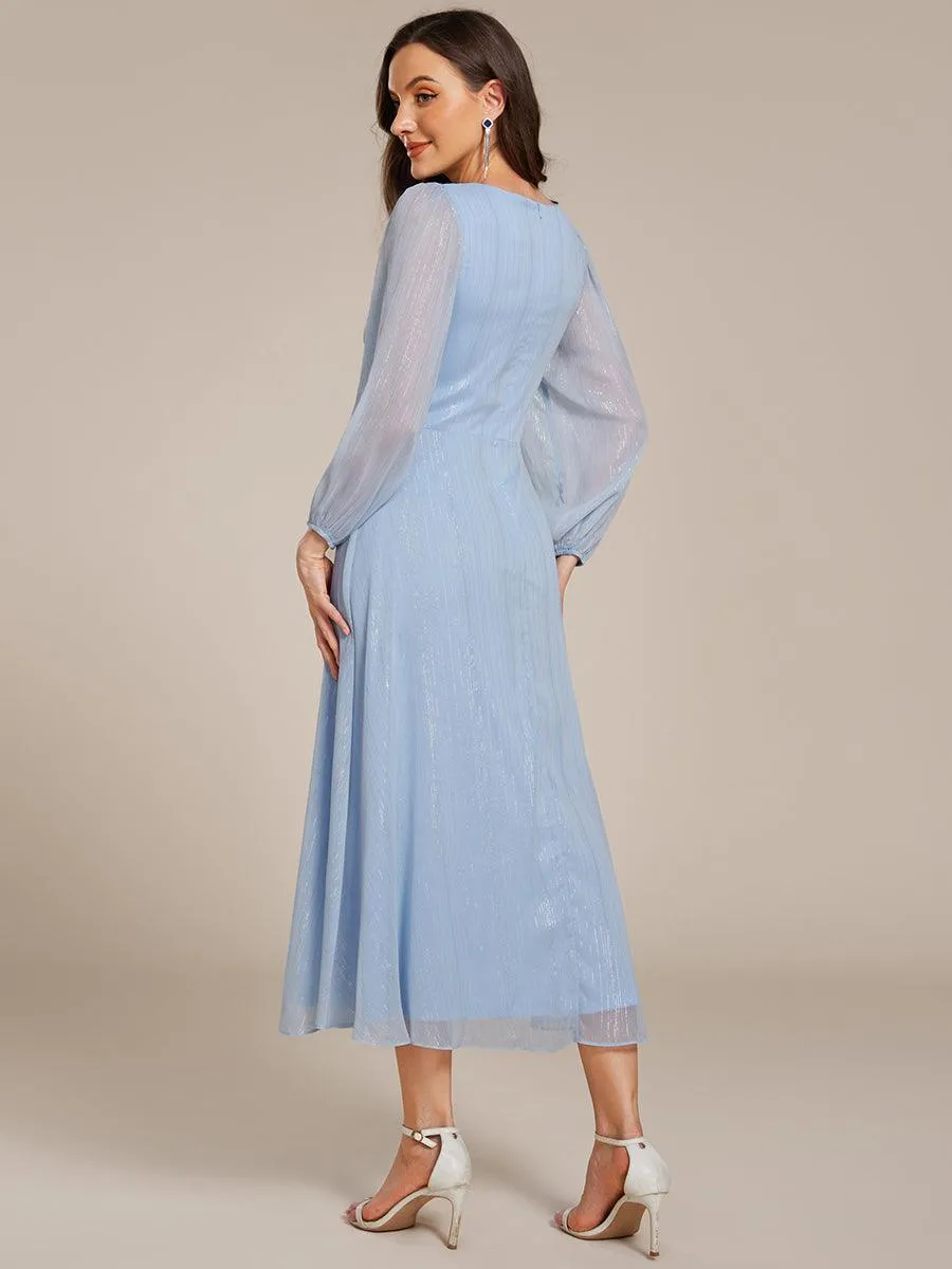 Robe de soirée trapèze scintillante à manches longues et col en V en mousseline de soie avec torsadé