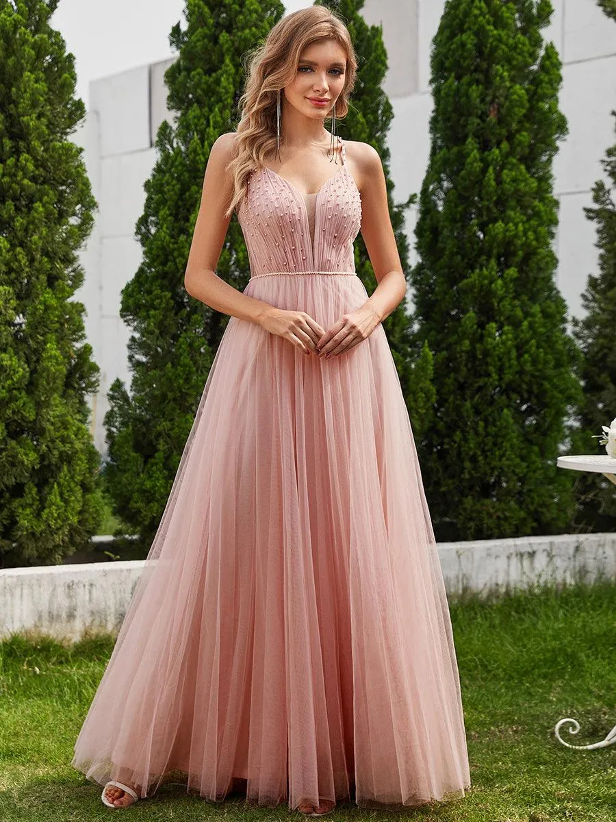 Robes de mariée trapèze à col en V et bretelles spaghetti, embellissements de perles