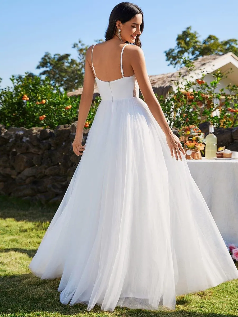 Robes de mariée trapèze à col en V et bretelles spaghetti, embellissements de perles