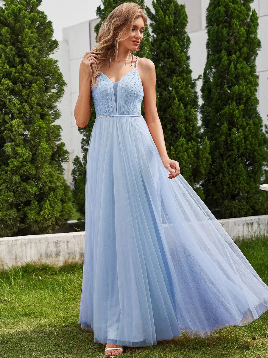 Robes de mariée trapèze à col en V et bretelles spaghetti, embellissements de perles