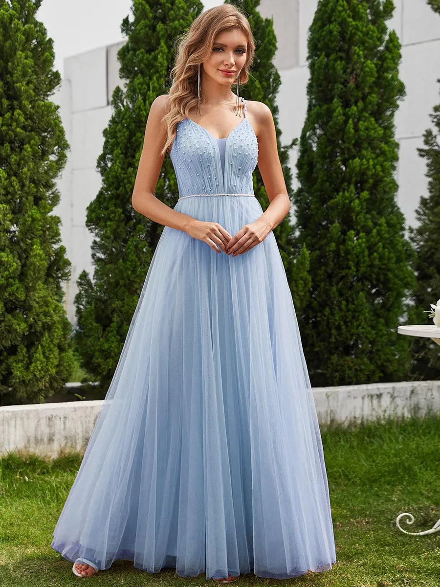 Robes de mariée trapèze à col en V et bretelles spaghetti, embellissements de perles