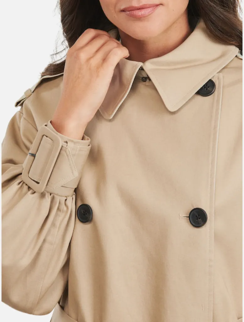 Women's beige coat with buttons
